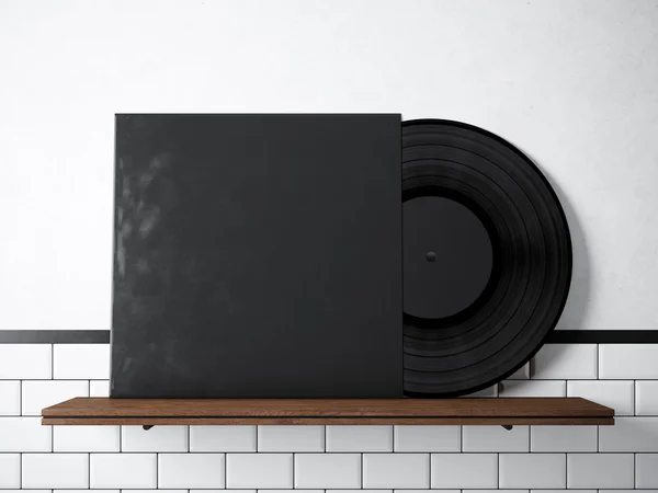 Photo vinyl music album template on natural wood bookshelf.White painted bricks wall background.Vintage style,high textured row materials.Black paper blank disk cover. Horizontal. 3D rendering.