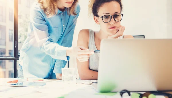 Coworkers Team Work Process Modern Office Loft.Producers Making Great Decisions New Creative Idea.Young Business Crew Working Startup.Laptop Wood Table.Analyze Market Reports.Blurred Film Flare Effect