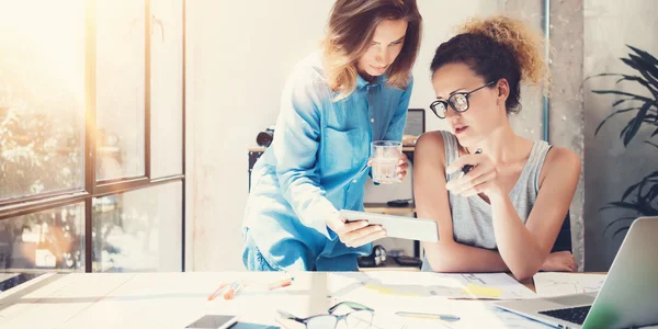 Coworkers Team Work Process Modern Interior Loft Office.Creative Producers Making Great Decisions New Idea.Young Business Crew Working Startup.Documents Wood Table.Analyze Reports.Blurred Film Effect.