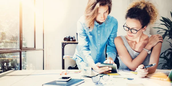 Coworkers Work Process Modern Office Loft.Young Professionals Making Great Decisions New Creative Idea.Business Team Working Startup.Laptop Wood Table.Analyze Sales Reports.Blurred Film Flare Effect