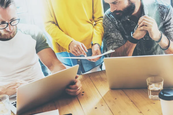 Business Startup People Brainstorming Process.Coworkers Making Great Decisions.Young Bearded Hipsters Team Discussion Corporate Work Concepts.Creative Manager Analyze Project Wood Table Modern Office.