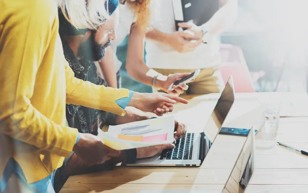 Young Woman Coworker Making Great Business Decisions.Marketing Team Discussion During Work Process Loft Office.Concept Hipsters Working Startup Idea Presentation Gadgets Wood Desk Table.Blurred.