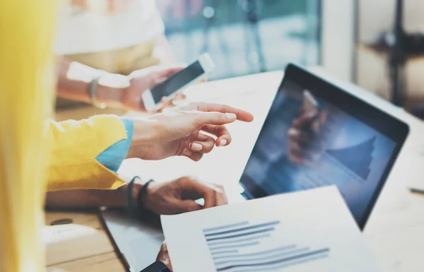 Closeup Young Woman Using Modern Tablet Hand.Hipster Working Great Business Idea Process.Coworkers People Gathered Together Decision Corporate Work.Startup Creative Presentation Concept Blurred.