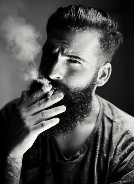 Bearded man with cigarette