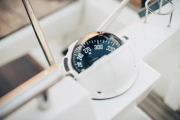 Big compass on a boat