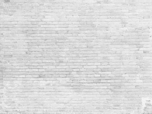 Part of white painted brick wall