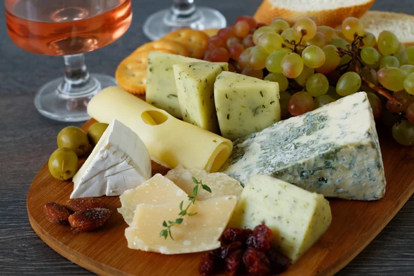 Autumn appetizer with cheese and fruits