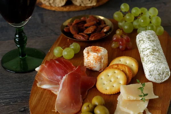 Autumn appetizer with cheese and fruits
