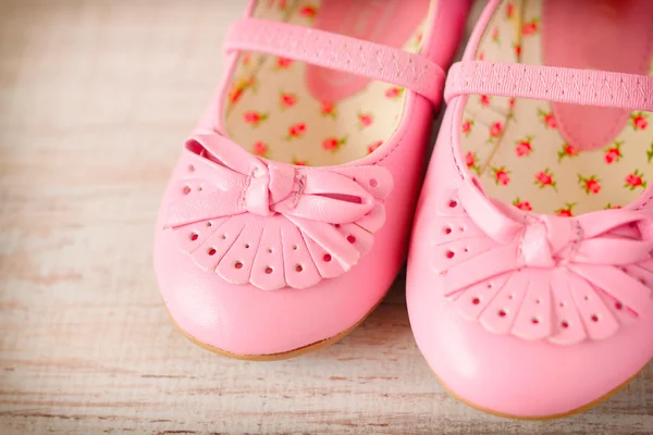 Detail of a pink girl shoes