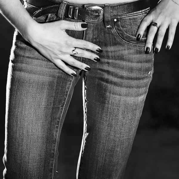 Slender woman in jeans
