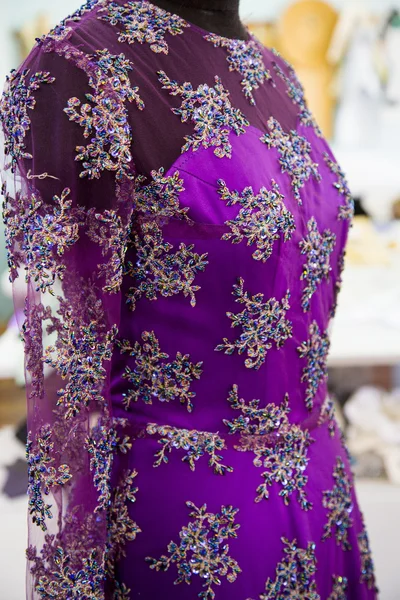 Violet dress on mannequin