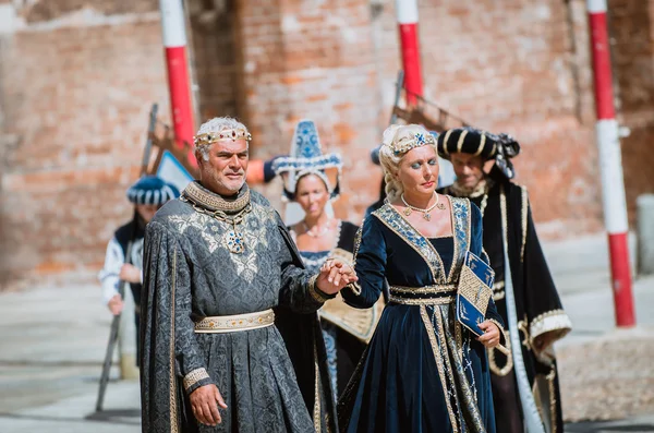 Couple of medieval nobles on parade