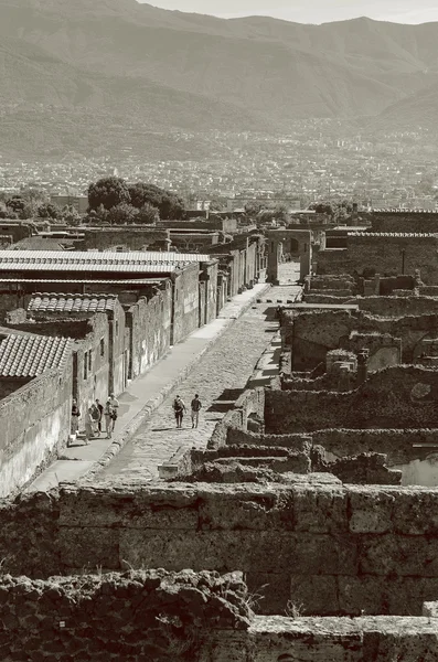 Tourists seen from the streets of Pompeii