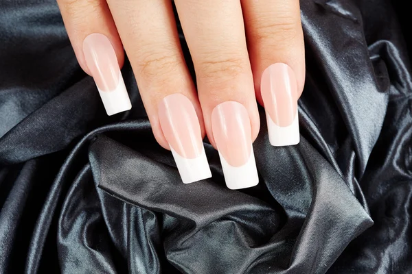 Nails with long artificial french manicure
