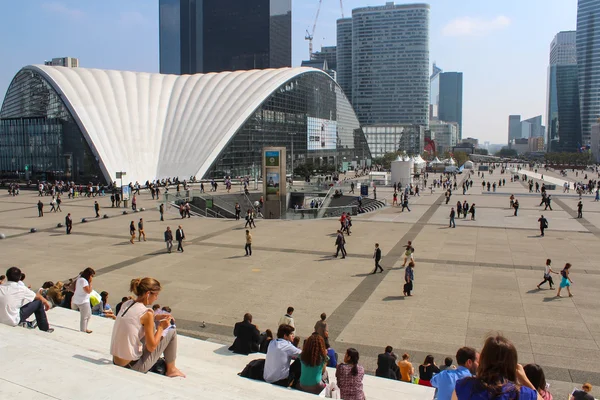 PARIS - SEPTEMBER 04: Tourists walking in the central square of La Defense a major business district of Paris