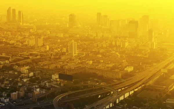 Aerial view to Bangkok downtown in the mist at sunrise,  Thailan