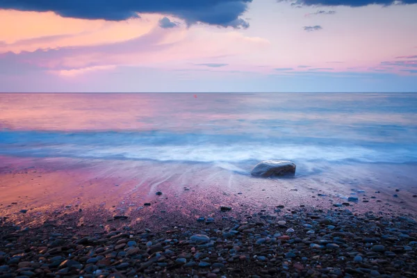 Stone in water