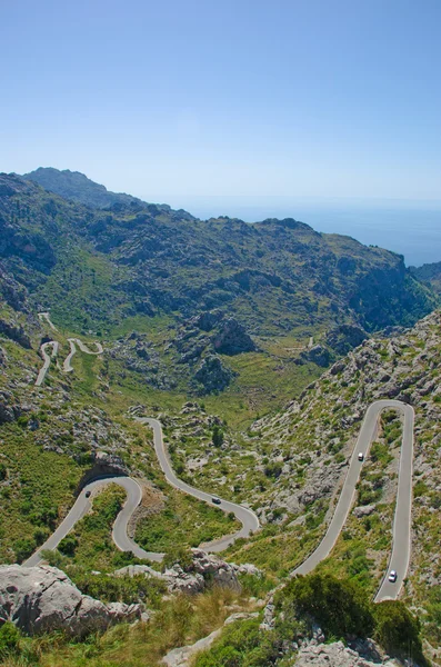 Winding road leading in Cala Tuent