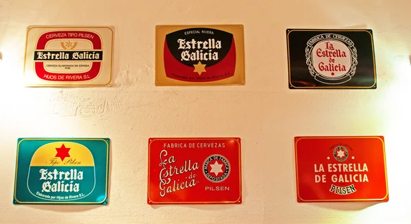 Menorca, Balearic islands, Spain: the various logos of Estrella Galicia in a pub in Mahon