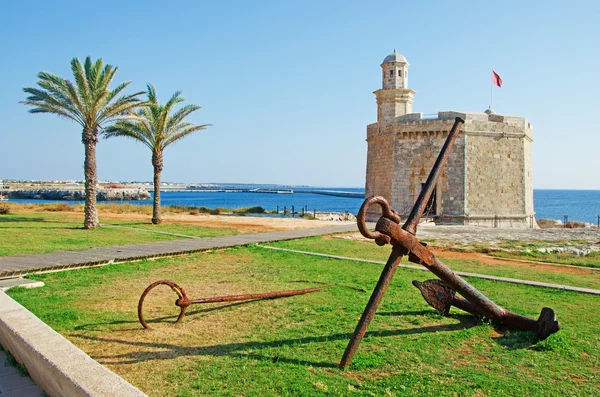 Menorca, Balearic Islands: an anchor and the Sant Nicolau Castle in Ciutadella