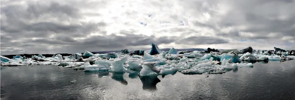 Iceland: panoramic view of the icebergs in the Jokulsarlon glacier lagoon