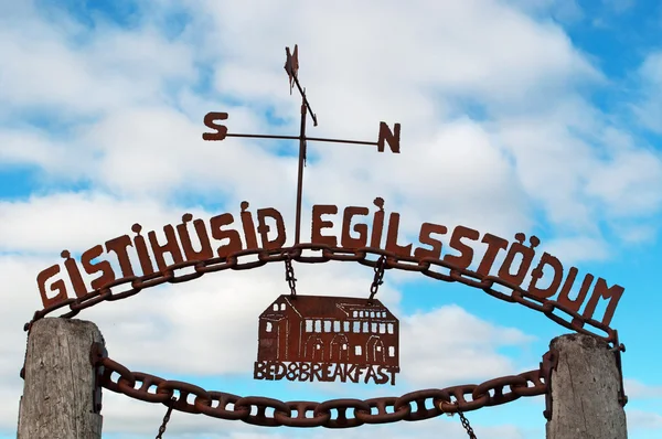 Iceland: the wrought iron sign of a bed and breakfast in Egilsstadir