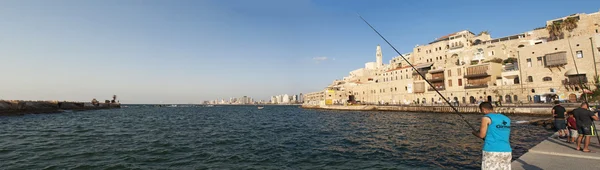 Israel: view of the Old City of Jaffa and the port with fishermen