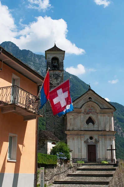 Switzerland: view of the Church of Saint Mary of the Angels and a Swiss flag