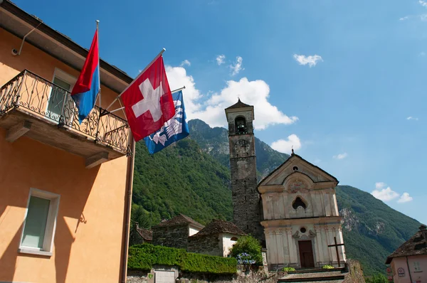 Switzerland: view of the Church of Saint Mary of the Angels and a Swiss flag
