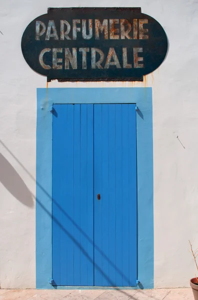 Fomenter, Balearic Islands: the light blue door of Parfumerie centrale,  a famous perfumery in Sant Francesc Xavier
