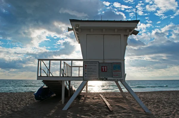 Fort Lauderdale beach, Ft. Lauderdale, sunbathing, lifeguard, guard tower, sunset light, sand, Broward County, Florida