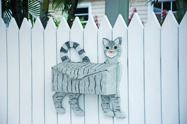 Mailbox shaped like a cat, white fence, palm, street art, Key West, Keys, Cayo Hueso, Monroe County, island, Florida