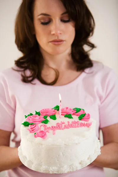 Pink: Woman Holds Pink Congratulations Cake