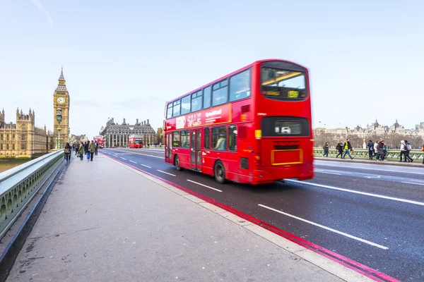 LONDON - JEN 15: A London red bus on Westminster Bridge on Jenua