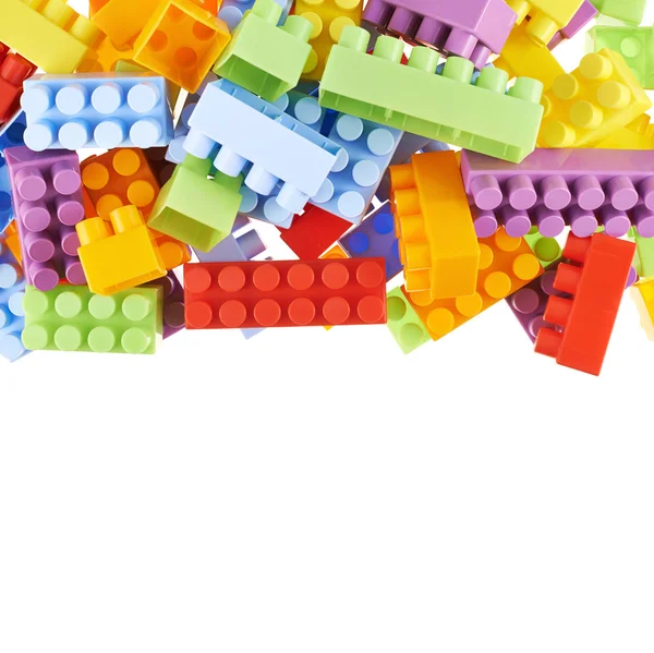 Pile of colorful toy construction bricks