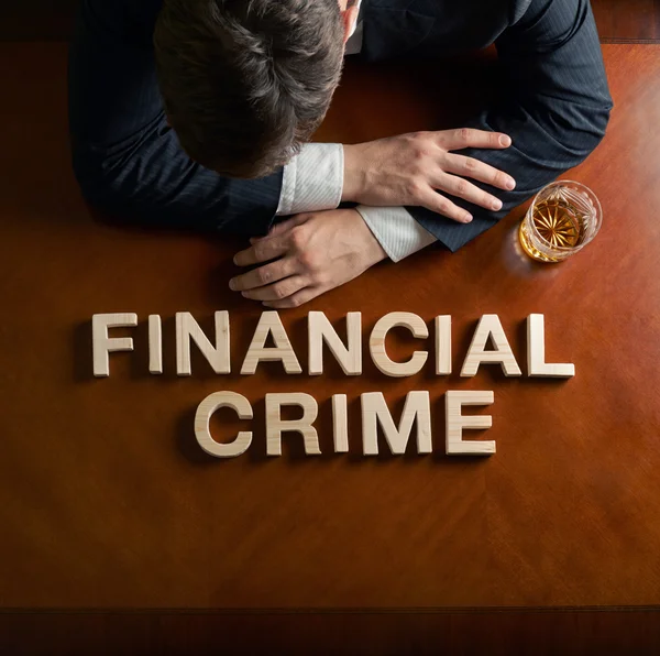 Phrase Financial Crime and devastated man composition