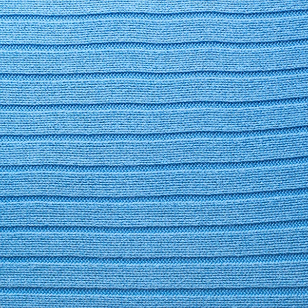 Knitted blue material fragment