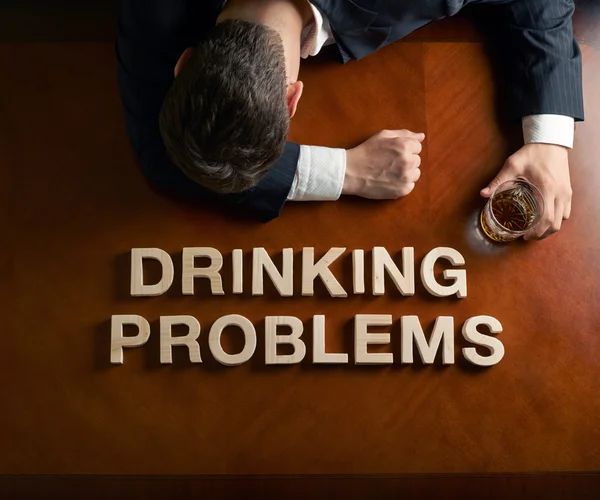 Phrase Drinking Problems and devastated man composition