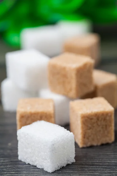 Brown cube sugar and white sugar