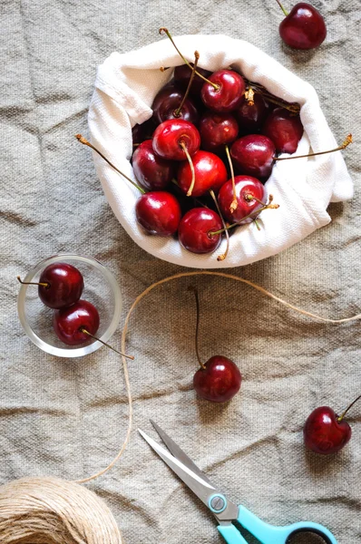 Cherries in linen bag, flat lay