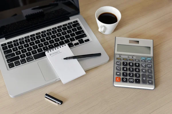 Blank Note Pad, Calculator, Computer, Pen on the Table - to-do list