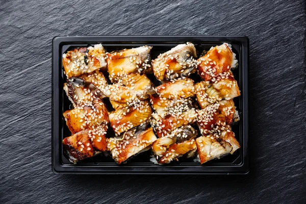Eel Sushi rolls in plastic box