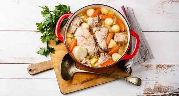 Stewed rabbit with potatoes and carrot