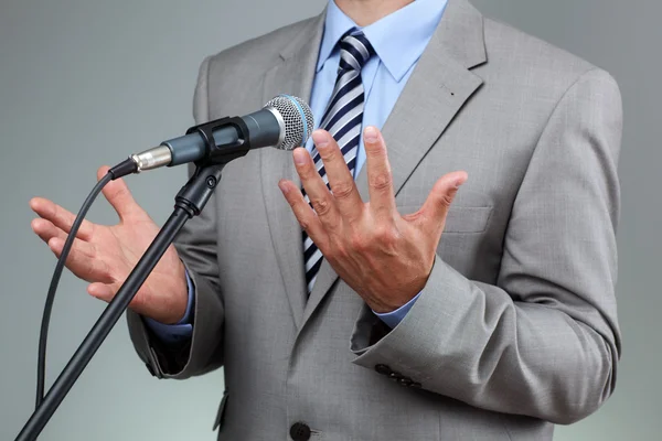 Speech with microphone and hand gesture
