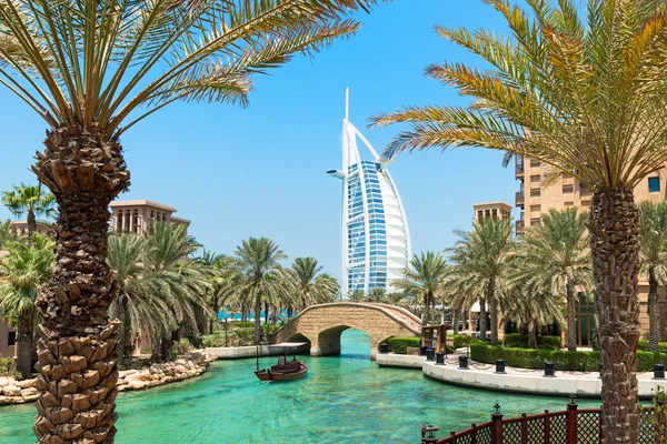 Burj Al Arab hotel Madinat Jumeirah in Dubai with palm trees