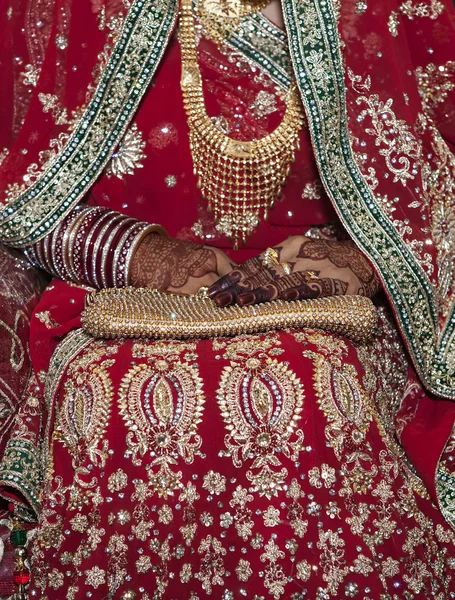 Female wearing elegant bangles and rings in hand.