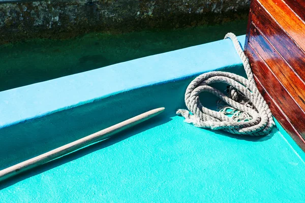 White mooring rope on boat or ship