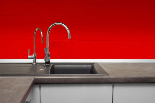 Stainless steel sink and faucet in kitchen room
