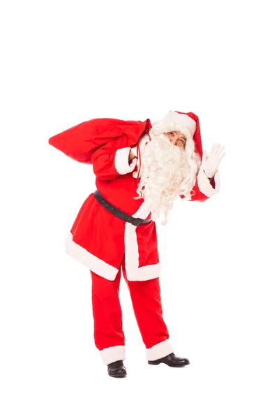 Santa claus holding his sack of gifts on white background