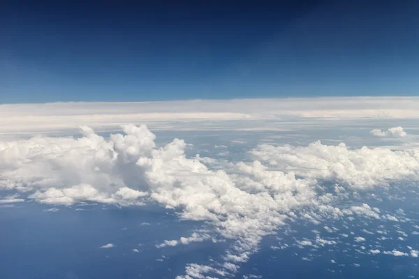 Aerial sky view with clouds from a plane
